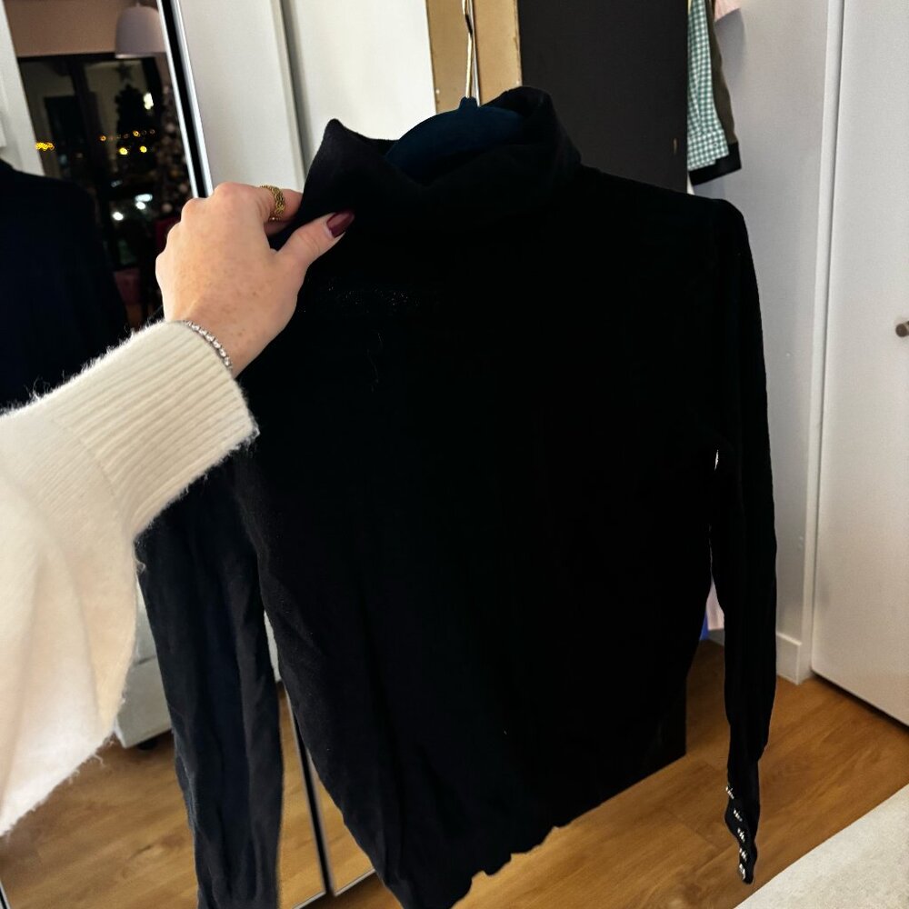 Classique col roulé noir
